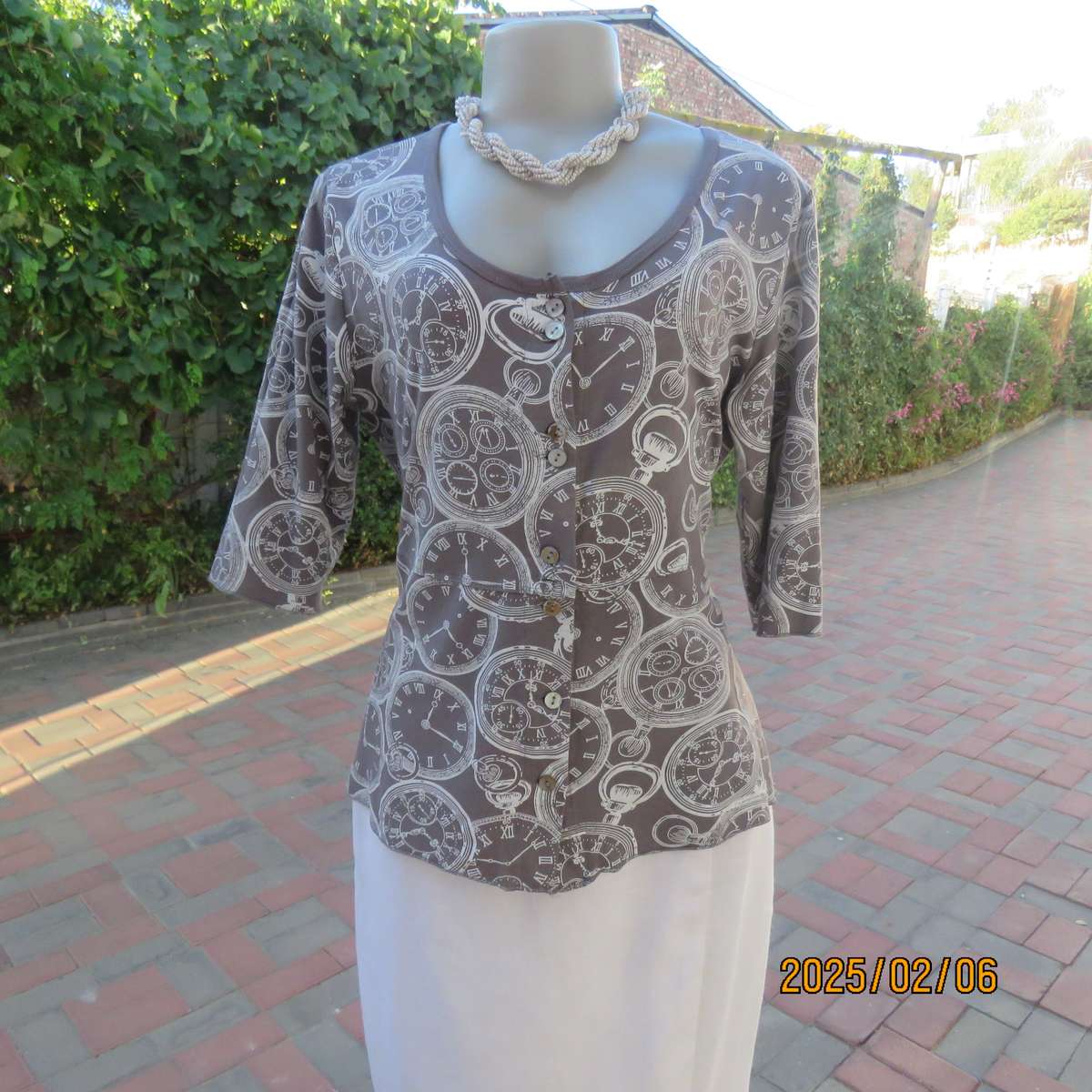 LA LIDA steel grey peplum style stretch polycotton top with white watch patterns. Size 38. As new.