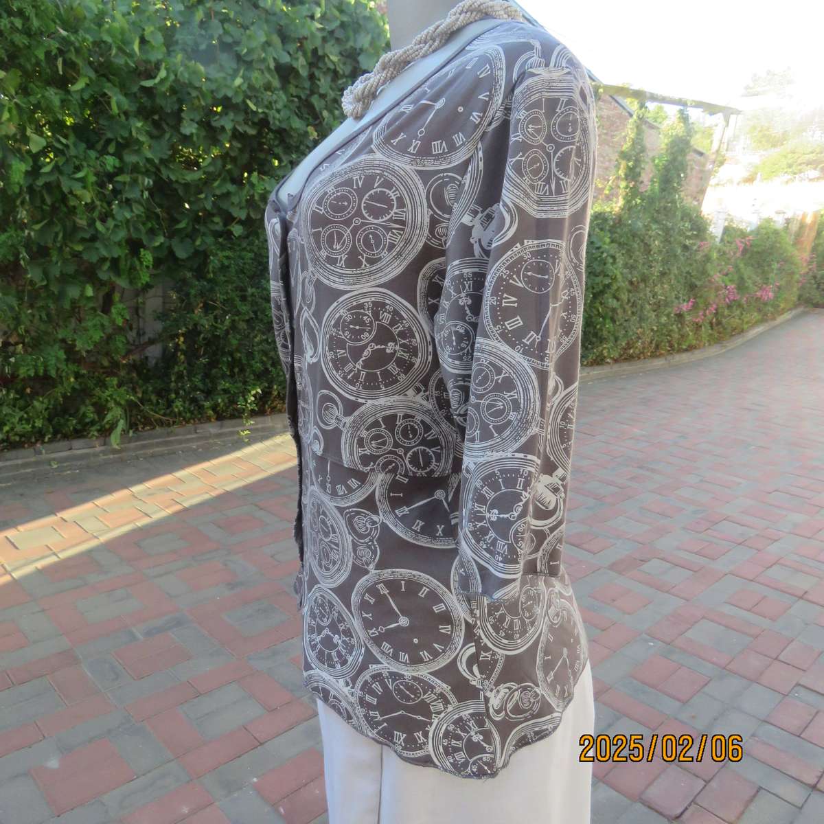 LA LIDA steel grey peplum style stretch polycotton top with white watch patterns. Size 38. As new.