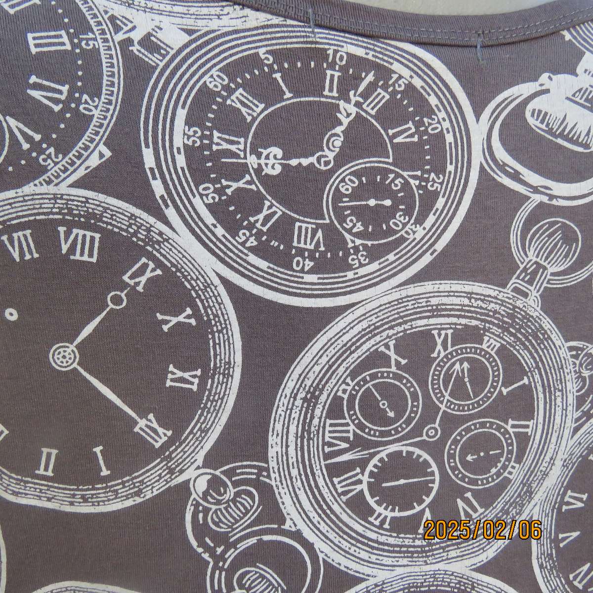 LA LIDA steel grey peplum style stretch polycotton top with white watch patterns. Size 38. As new.