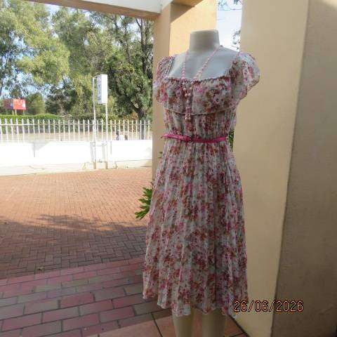 Permanent pleated sheer polyester floral dress. Elasticated waist + wide frilled neckline Size 34
