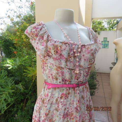 Permanent pleated sheer polyester floral dress. Elasticated waist + wide frilled neckline Size 34