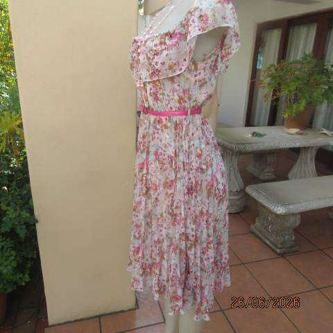 Permanent pleated sheer polyester floral dress. Elasticated waist + wide frilled neckline Size 34