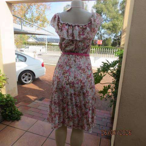 Permanent pleated sheer polyester floral dress. Elasticated waist + wide frilled neckline Size 34