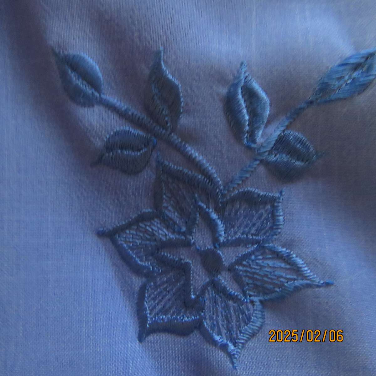Fabulous true blue richly embroidered short sleeve polycotton top. Size 40-42. Double collar. As new