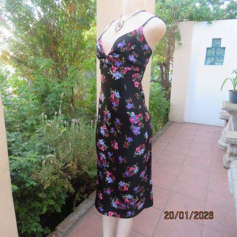 Black silky polyester with pink-blue posy strappy dress and fold over bust. Size 33