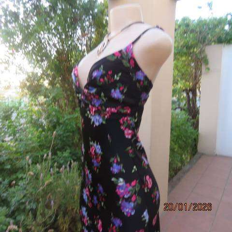 Black silky polyester with pink-blue posy strappy dress and fold over bust. Size 33