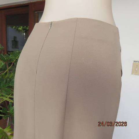 WOOLWORTHS oatmeal paneled stretch skirt size 36 with kick-out design