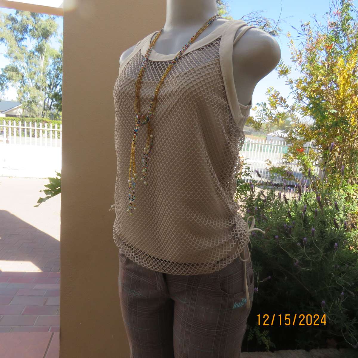 Charming 2 pc wheat colour top with cami and mesh overlayer.Size 36 by OAKTREE. Brand new cond