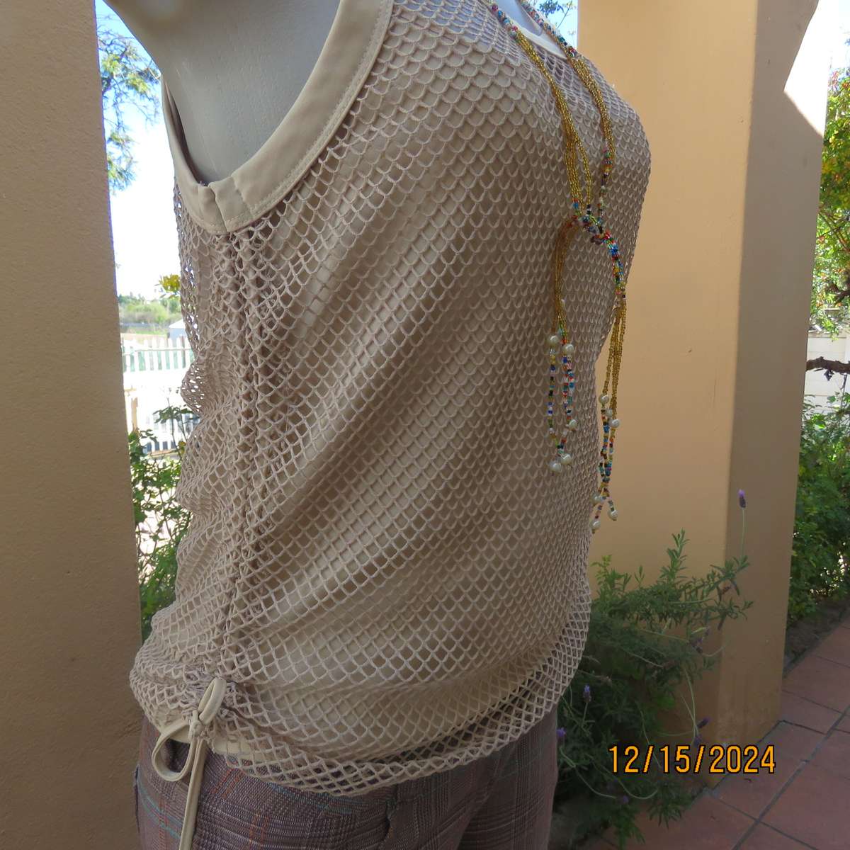 Charming 2 pc wheat colour top with cami and mesh overlayer.Size 36 by OAKTREE. Brand new cond