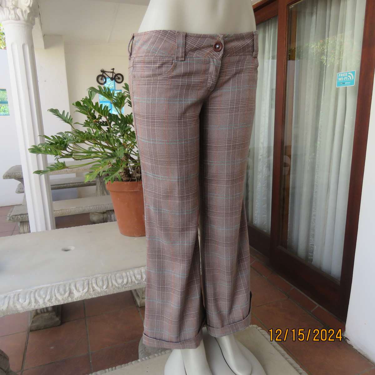 Tartan check bootcut woven poly-rayon pants in autumn colours. Size 34