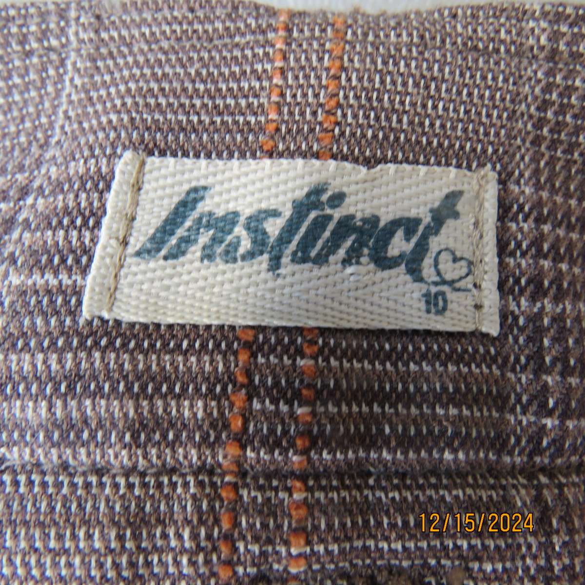 Tartan check bootcut woven poly-rayon pants in autumn colours. Size 34