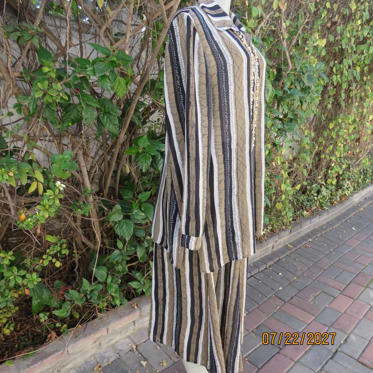 LARGELY FEMININE 2 pc polyester A-line skirt and long sleeve top outfit. Vertical striped. Size 42