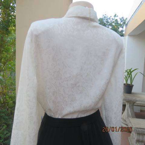 MERIEN HALL light cream crinkled floral embossed long sleeve polyester top. Size 40.