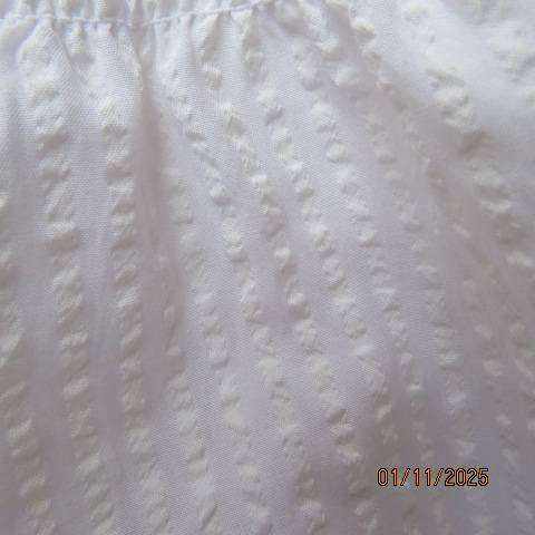Very white bubble polycotton off the shoulder top size 40 with short sleeves.