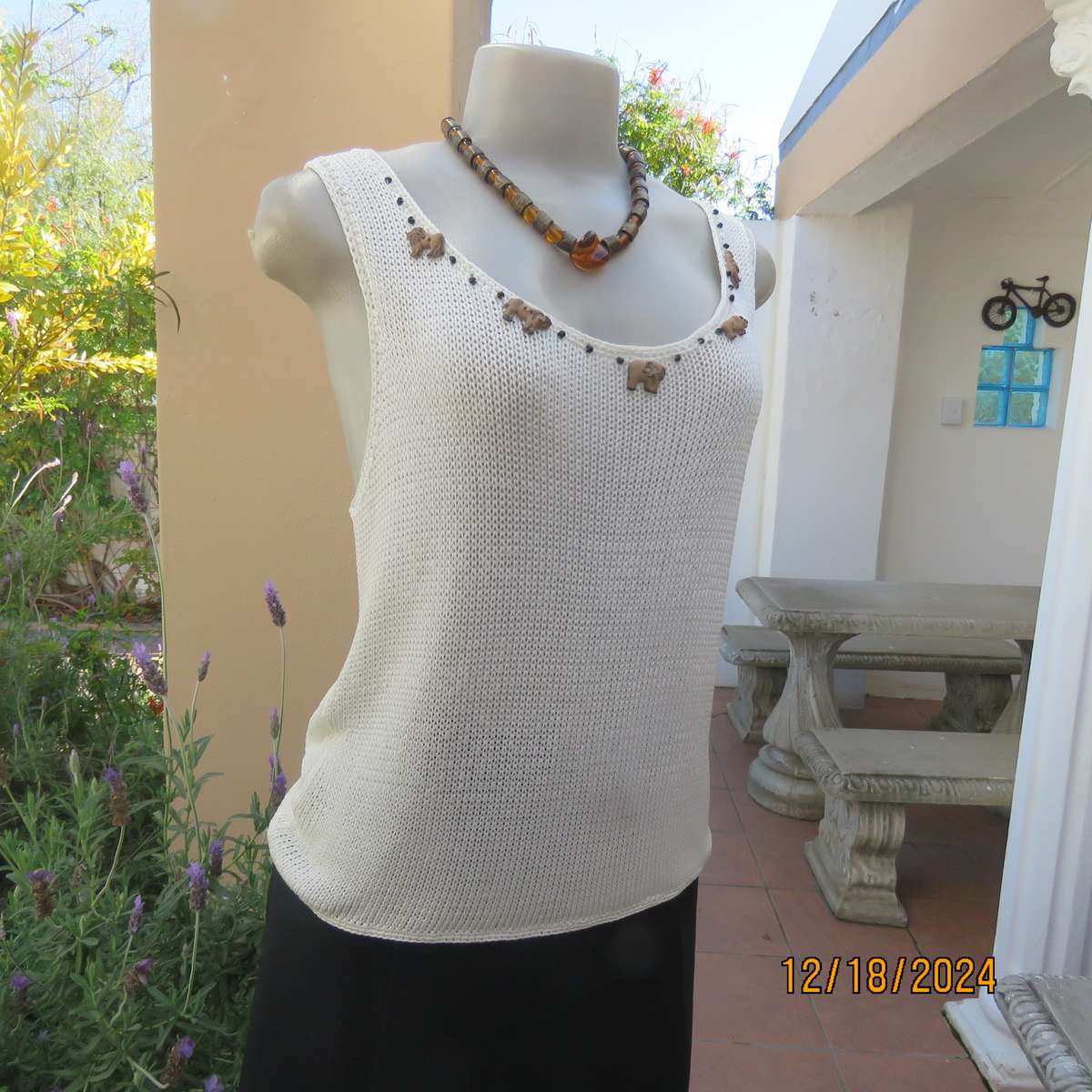 Amazing polyester knit cream sleeveless top. Big 5 with black bead embellishment. By TAWANA 38