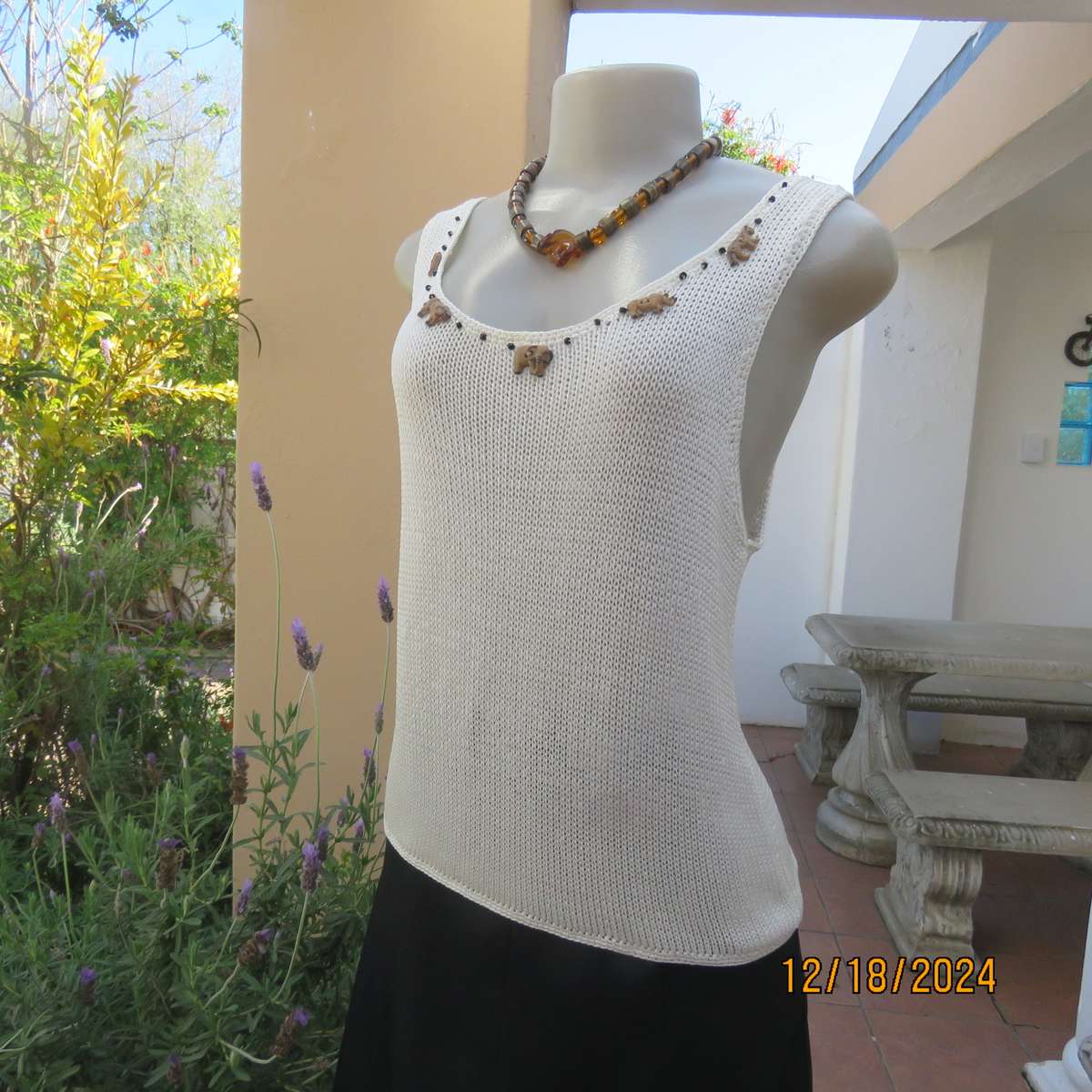 Amazing polyester knit cream sleeveless top. Big 5 with black bead embellishment. By TAWANA 38