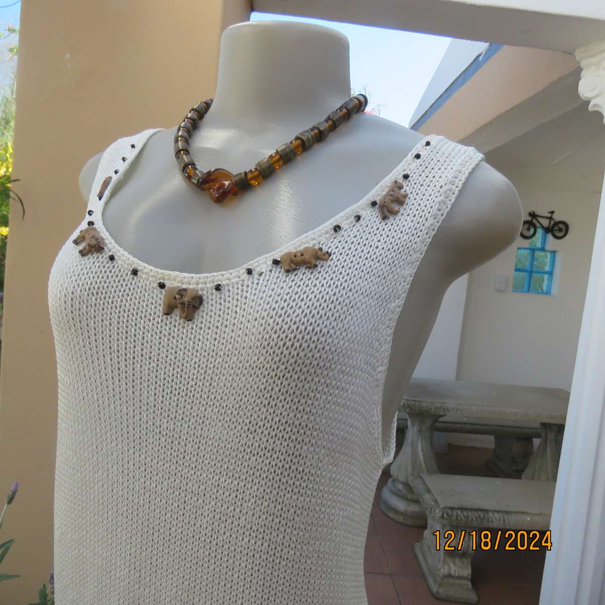 Amazing polyester knit cream sleeveless top. Big 5 with black bead embellishment. By TAWANA 38