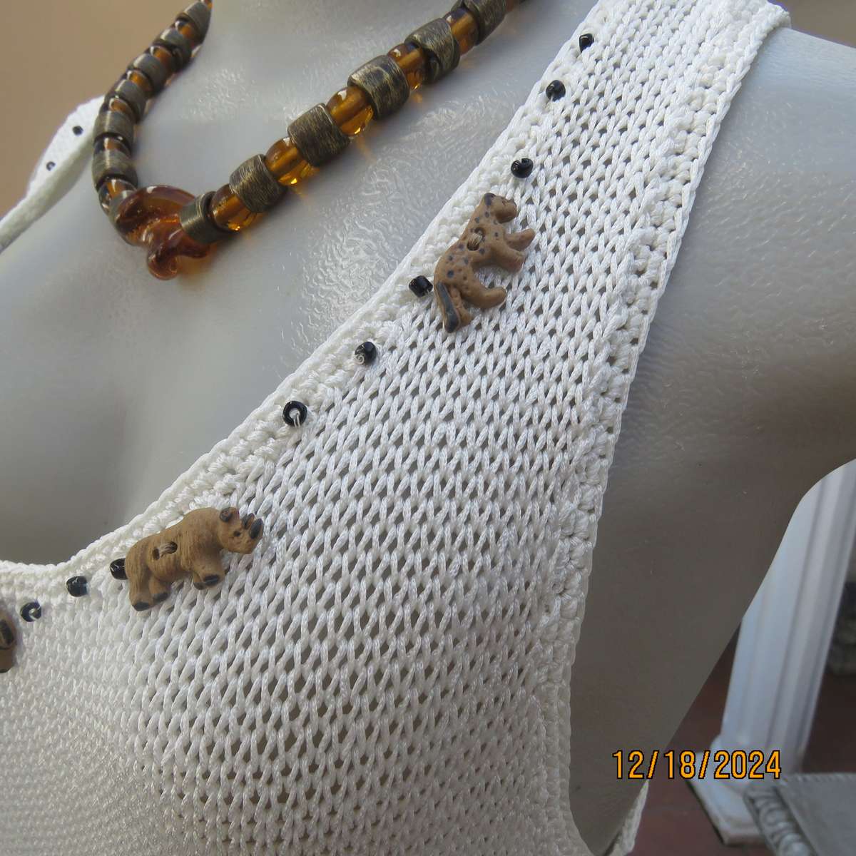 Amazing polyester knit cream sleeveless top. Big 5 with black bead embellishment. By TAWANA 38
