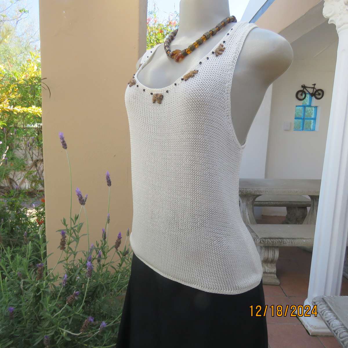 Amazing polyester knit cream sleeveless top. Big 5 with black bead embellishment. By TAWANA 38