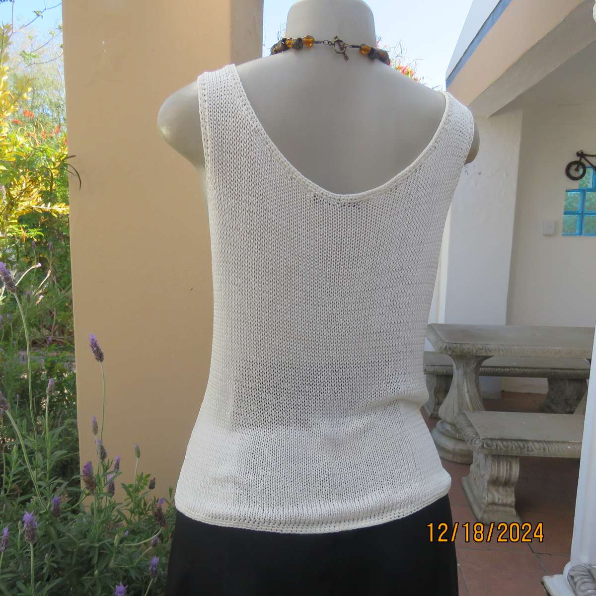 Amazing polyester knit cream sleeveless top. Big 5 with black bead embellishment. By TAWANA 38