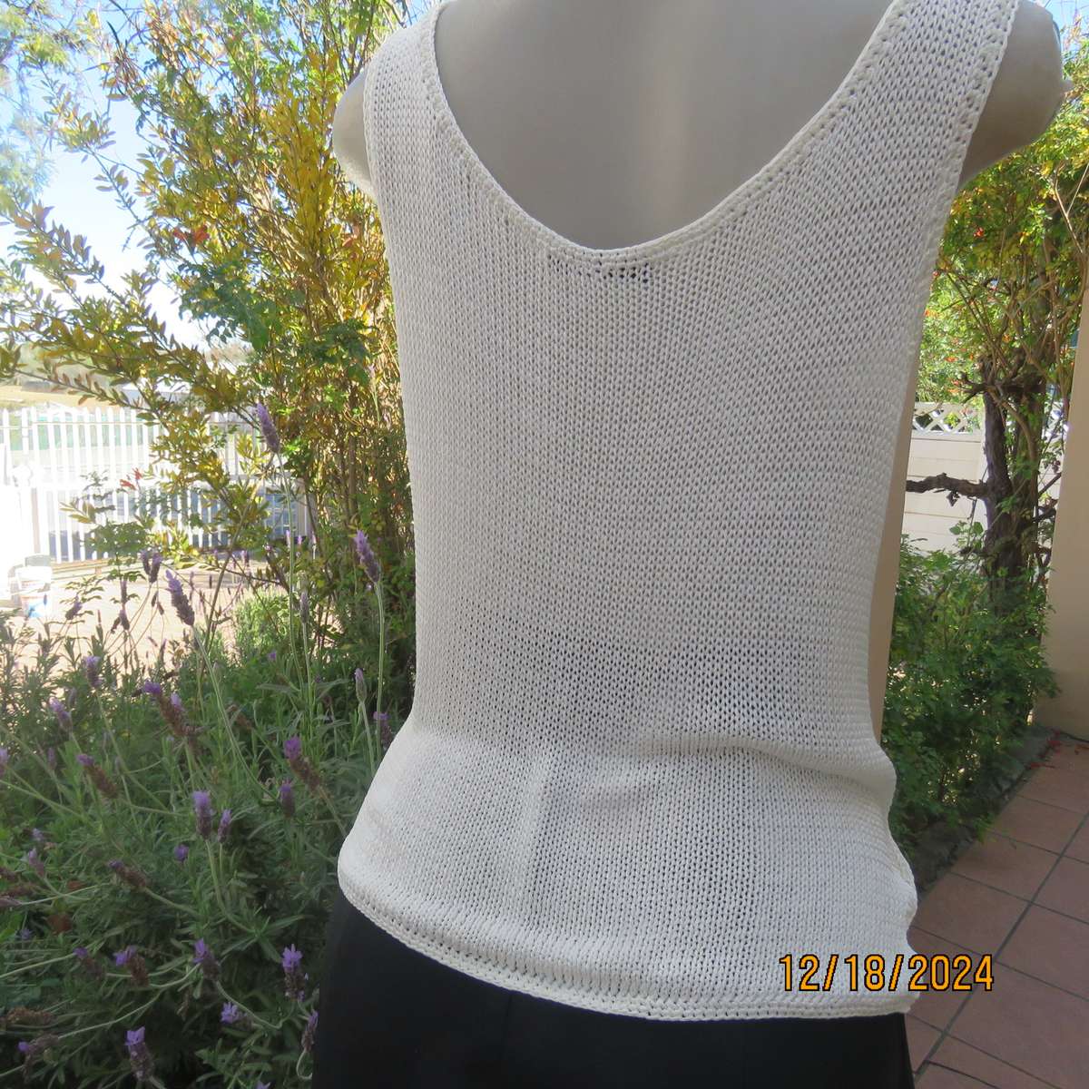 Amazing polyester knit cream sleeveless top. Big 5 with black bead embellishment. By TAWANA 38