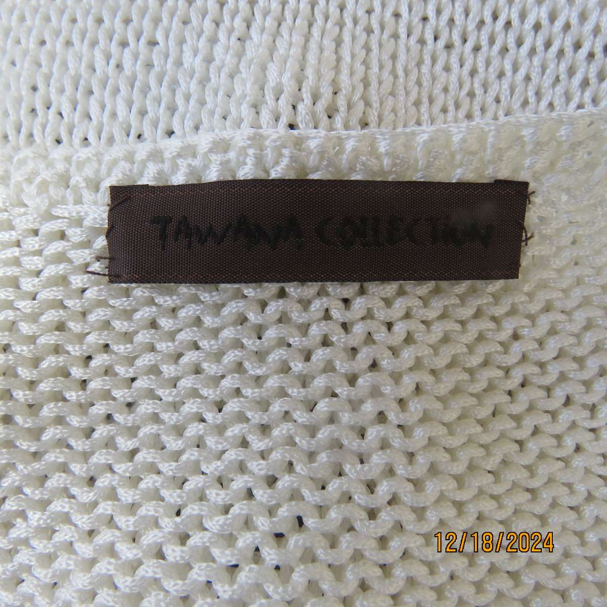 Amazing polyester knit cream sleeveless top. Big 5 with black bead embellishment. By TAWANA 38