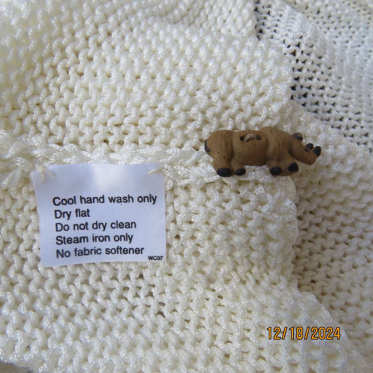 Amazing polyester knit cream sleeveless top. Big 5 with black bead embellishment. By TAWANA 38