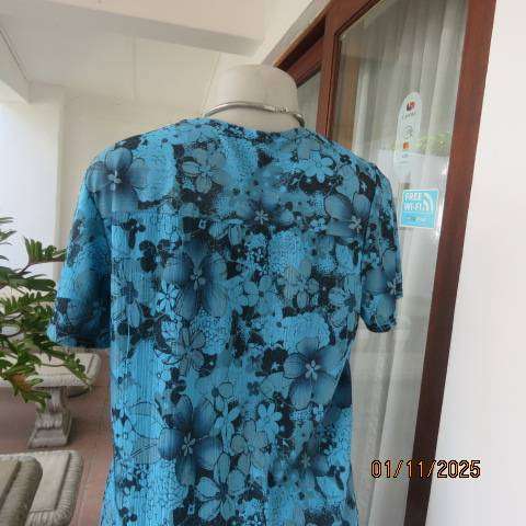 Turkish blue textured stretch polyester top with black floral print in size 38-40