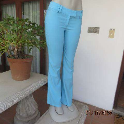 URB cornflower blue low rise size 32 flare leg stretch polyester pants.