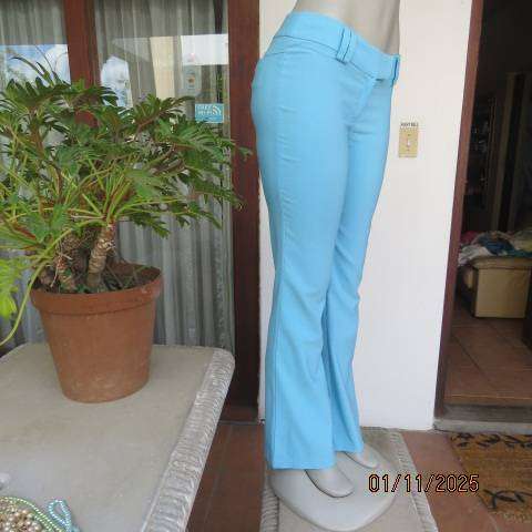 URB cornflower blue low rise size 32 flare leg stretch polyester pants.