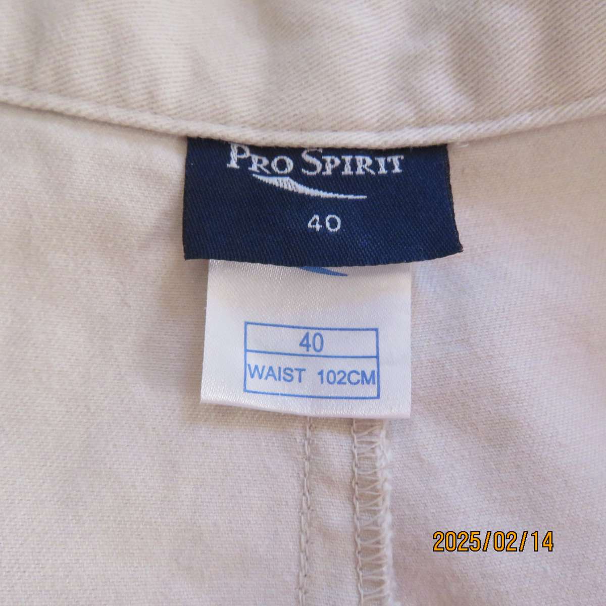 PRO SPIRIT 100% cotton light beige pants. Pleats on front. Size 36. Leg tapering. As new condition.