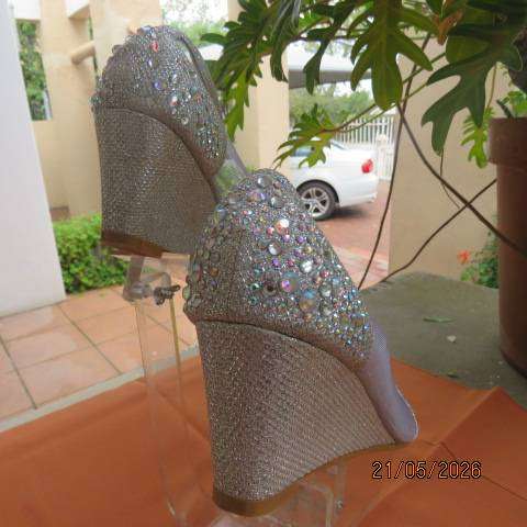 Silver DIVA wedge heels with gauze sides and embellished fronts, size 5