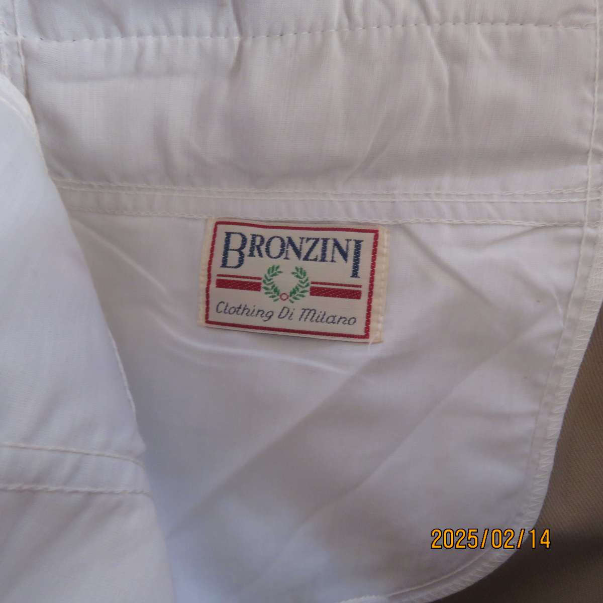 BRONZINI men's rich cream textured 100% polyester pants. Size 36. Size and 1 back pocket. As new
