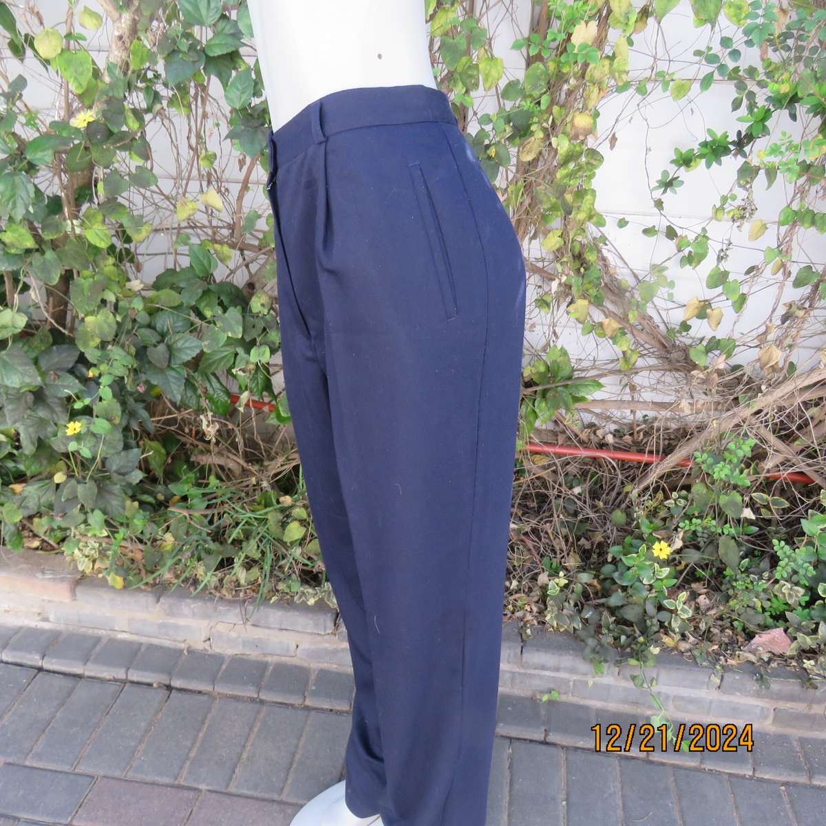 Classic navy poly/viscose dress pants with pleats on front.Size 40. Straight tapered legs.WOOLWORTHS