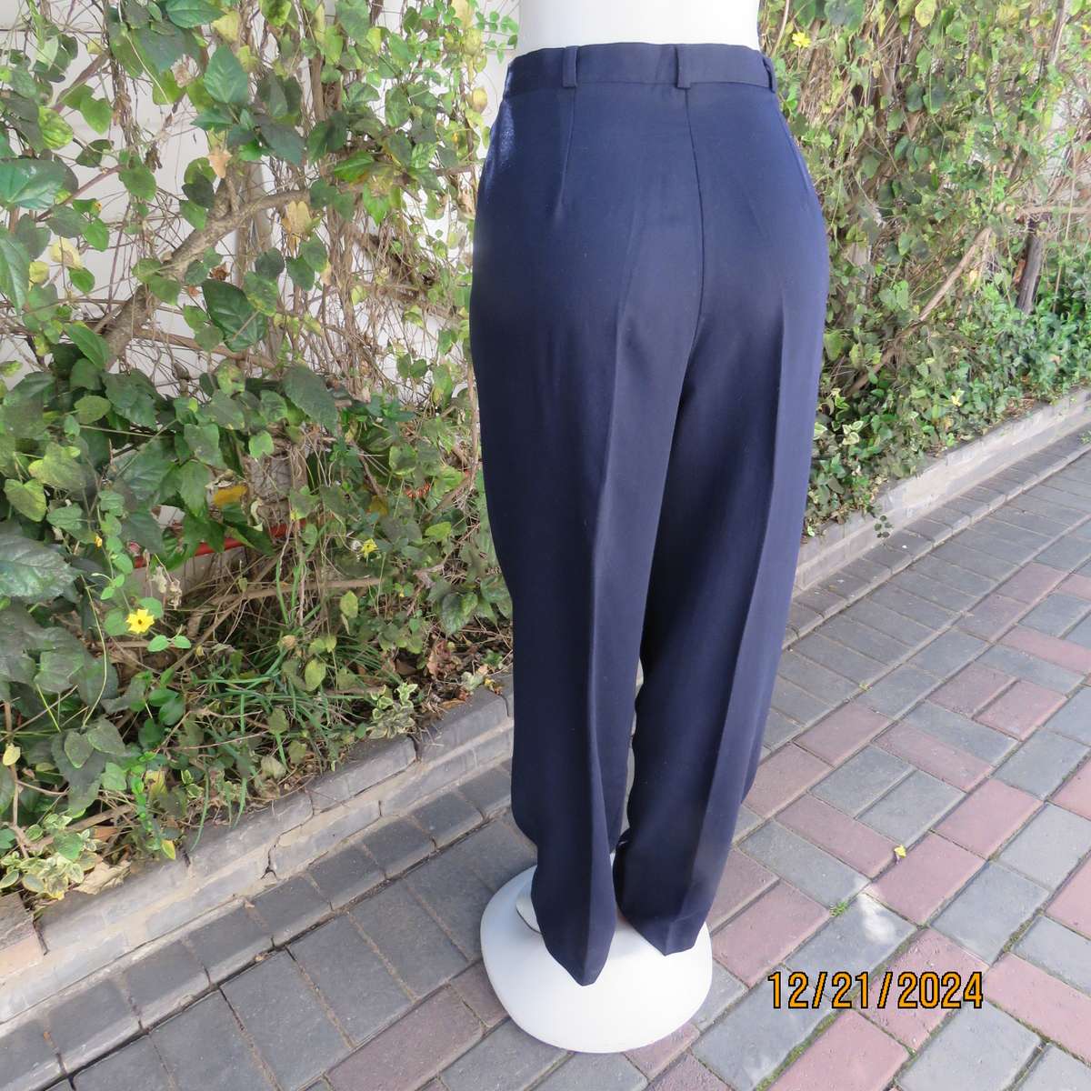 Classic navy poly/viscose dress pants with pleats on front.Size 40. Straight tapered legs.WOOLWORTHS