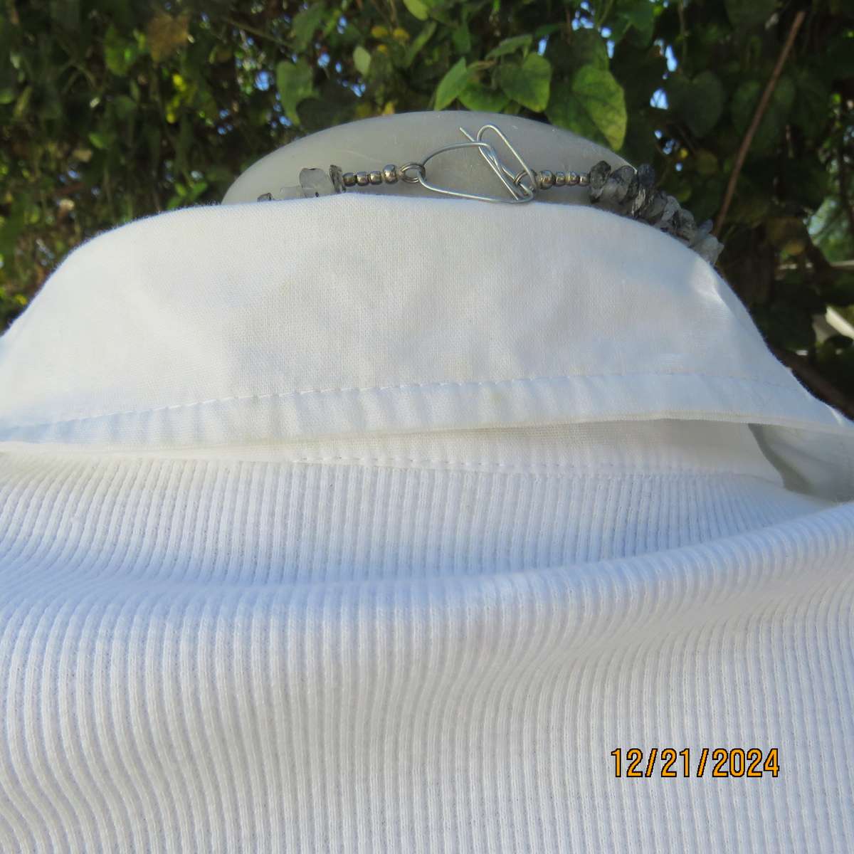 High quality white JEEP Top with Banded V neck and collar. Size 38. Capped sleeves. New cond.