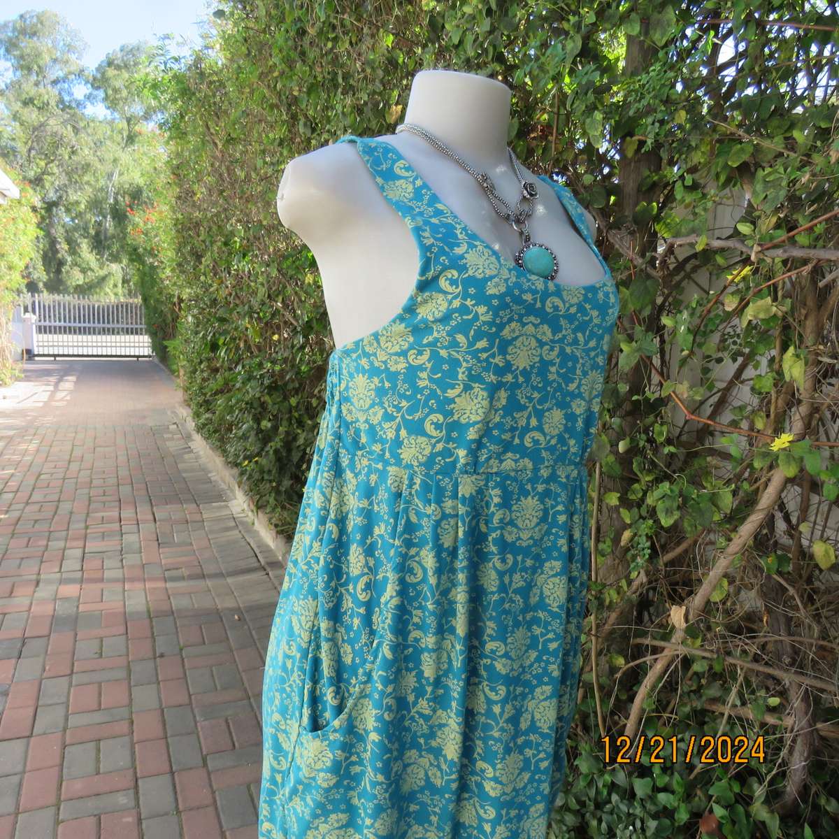 Cute mini dress in jade with gold colour baroque pattern. Deep side pockets. Size 36.Cotton.