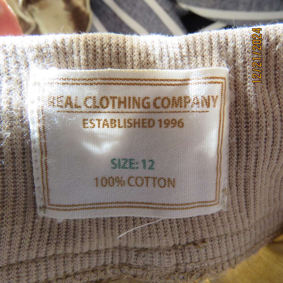 REAL Clothing easy to wear wheat cropped cotton pants. Knitted elastic waistband. .Size 36.