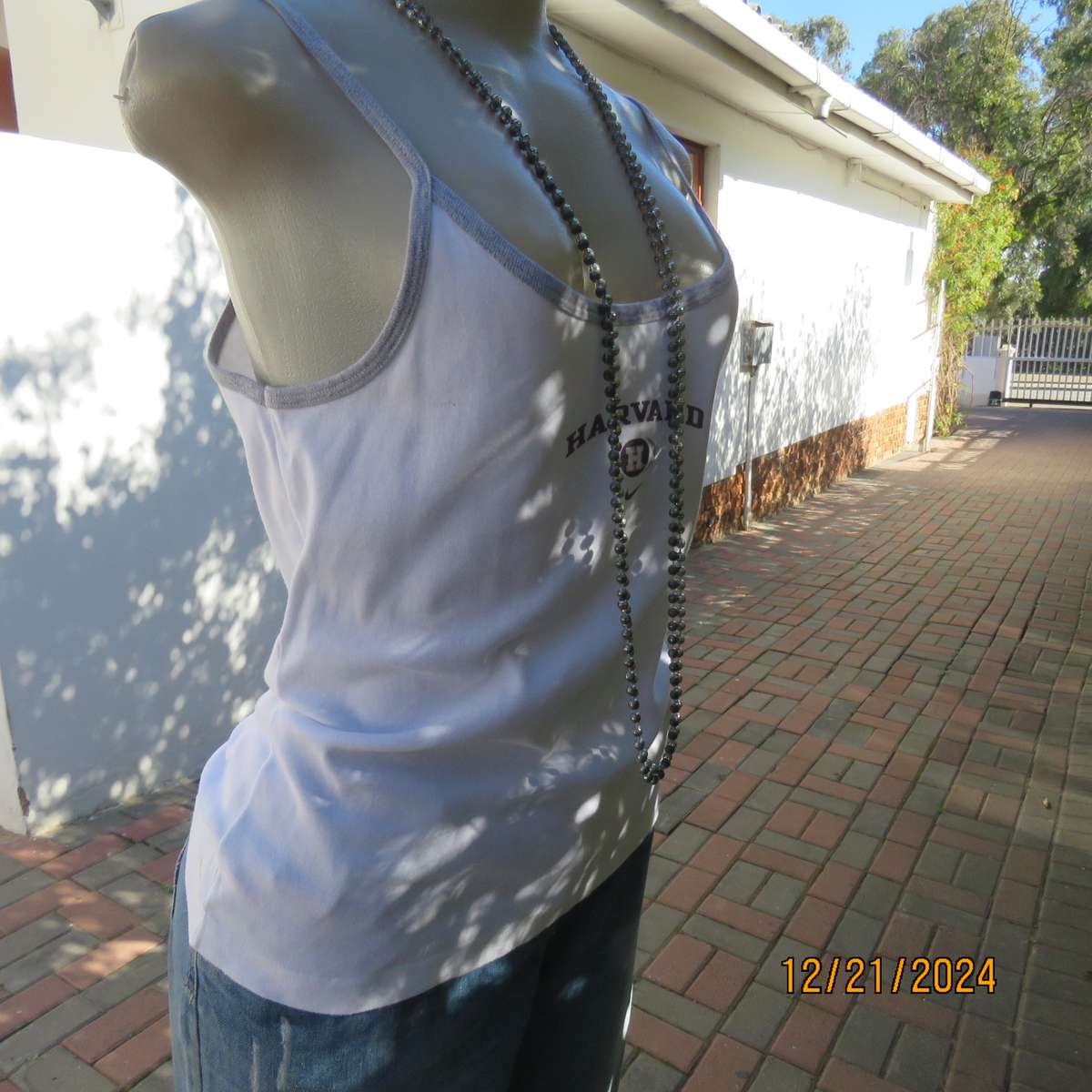 NIKE strappy top in white/silvergrey with HARVARD logo. Size 38. 100% cotton. Brand new cond.