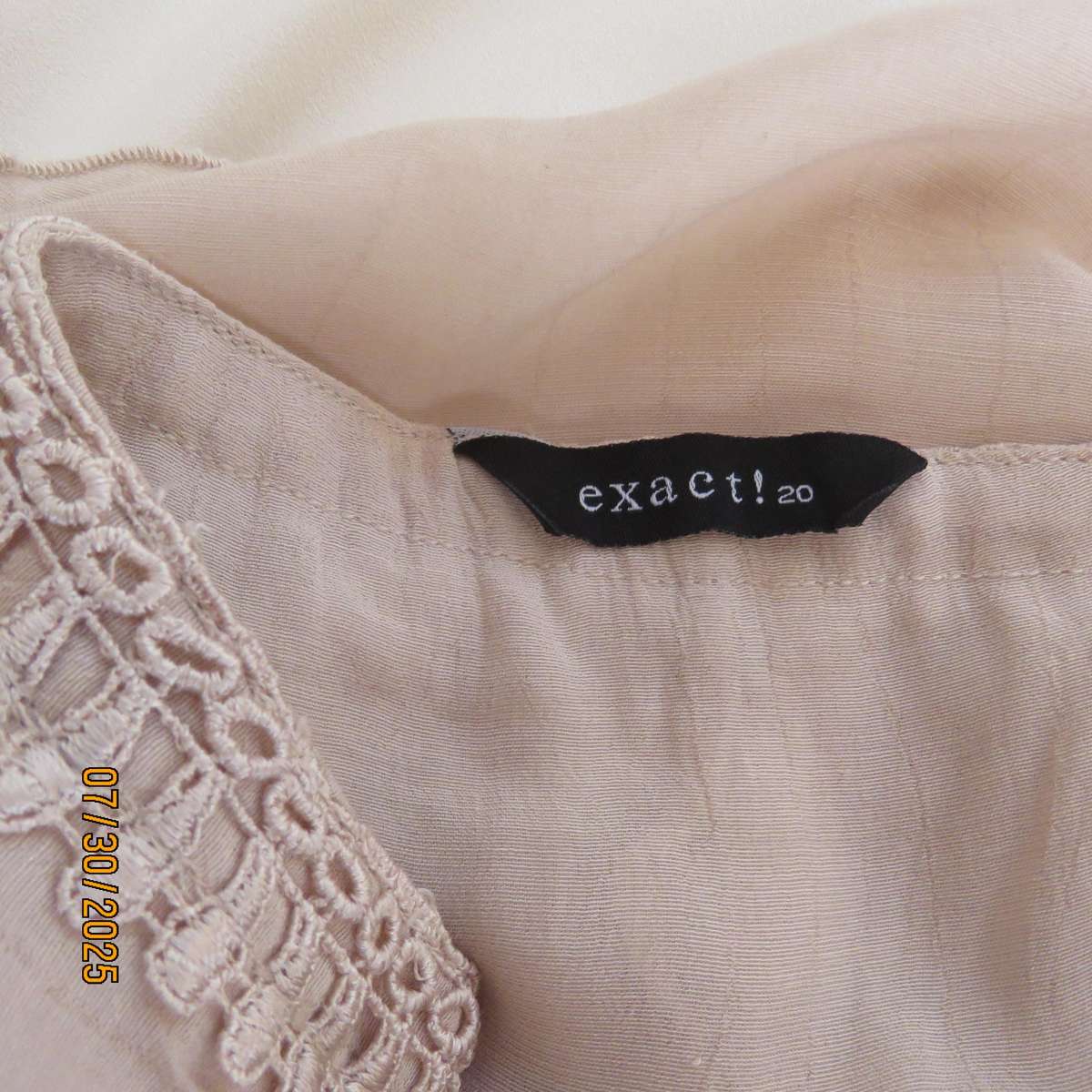 EXACT rich cream viscose-polyester slip over frilled V neck top. Size 44