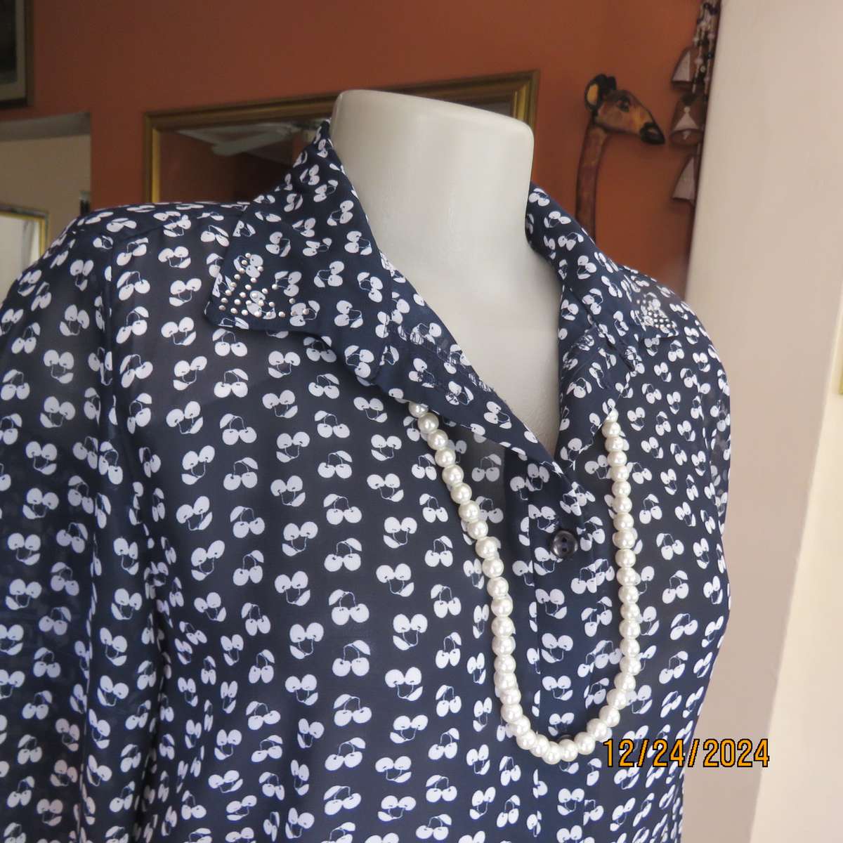 Pretty sheer polyester navy/white floral button down/shirt collar top/ Long sleeve.Size 37. As new