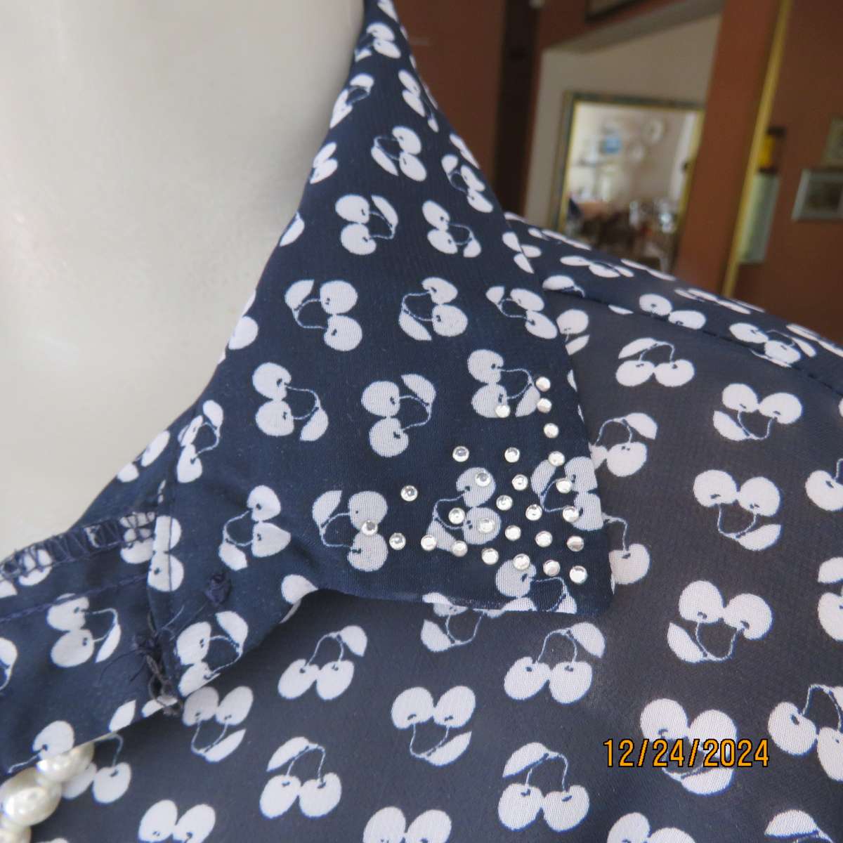 Pretty sheer polyester navy/white floral button down/shirt collar top/ Long sleeve.Size 37. As new