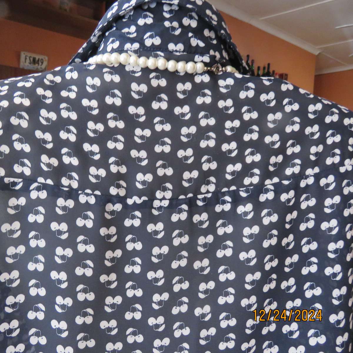 Pretty sheer polyester navy/white floral button down/shirt collar top/ Long sleeve.Size 37. As new