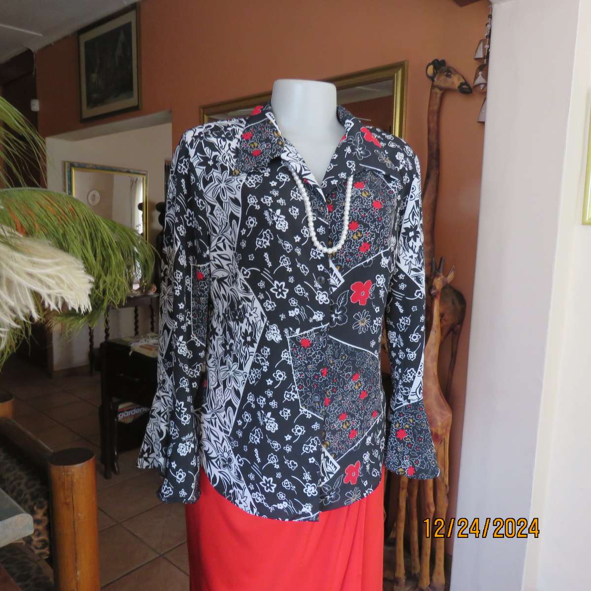 Unique flare cuffed long sleeve top in black/red/white pattern blocks. Button down.Size 37. AS new
