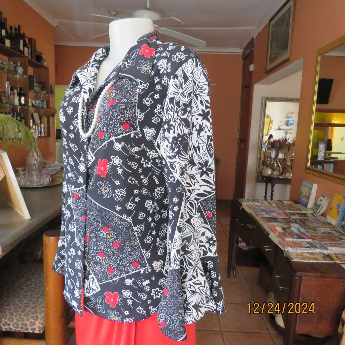 Unique flare cuffed long sleeve top in black/red/white pattern blocks. Button down.Size 37. AS new