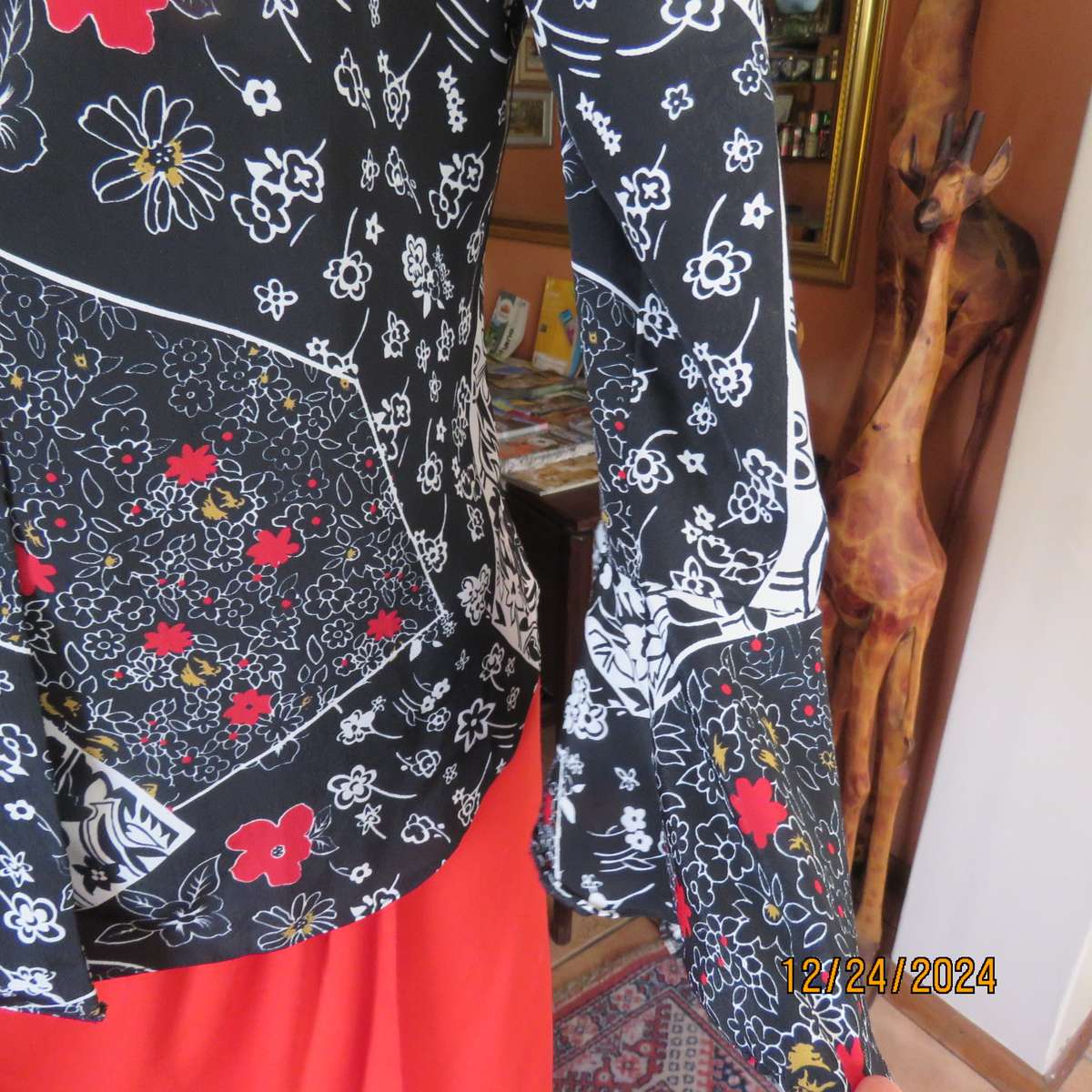 Unique flare cuffed long sleeve top in black/red/white pattern blocks. Button down.Size 37. AS new