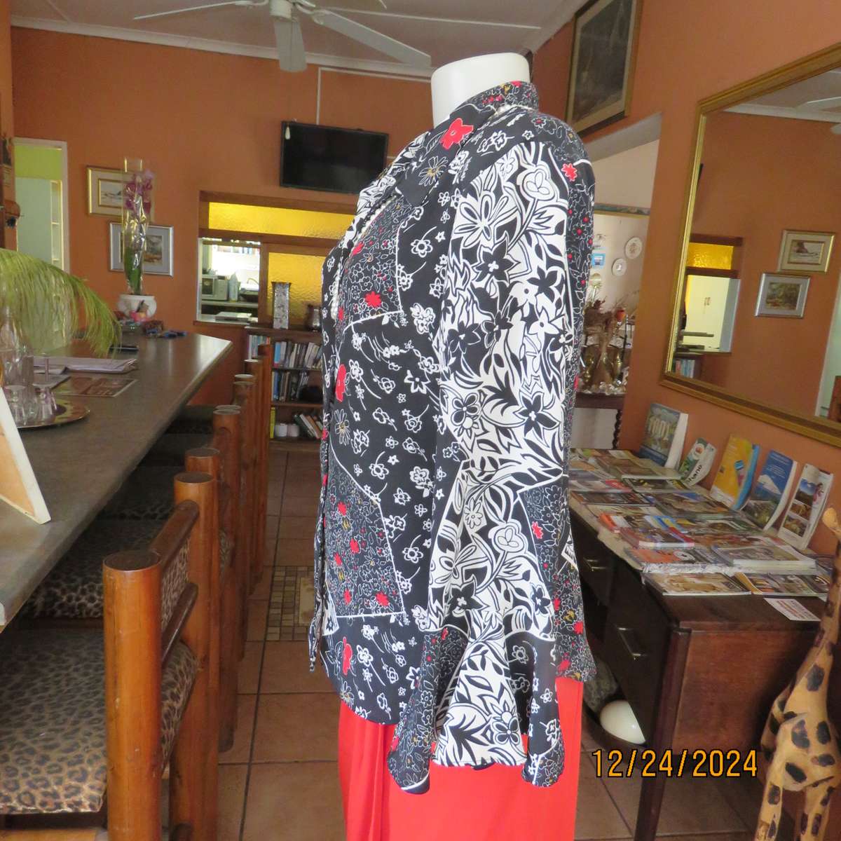 Unique flare cuffed long sleeve top in black/red/white pattern blocks. Button down.Size 37. AS new