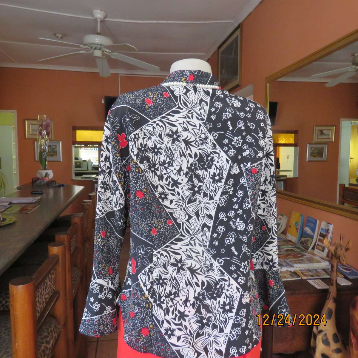 Unique flare cuffed long sleeve top in black/red/white pattern blocks. Button down.Size 37. AS new