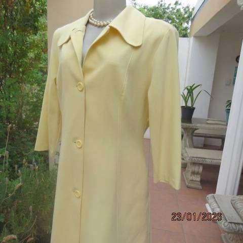 MILADYS banana yellow 2 pc suite. Bootlegged dress pants. Long lined jacket-coat. Size 37