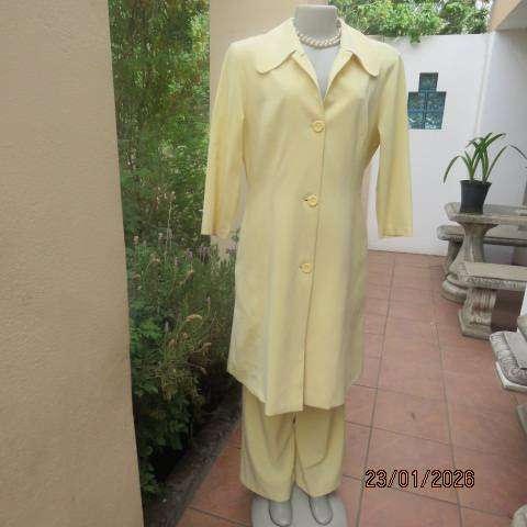 MILADYS banana yellow 2 pc suite. Bootlegged dress pants. Long lined jacket-coat. Size 37